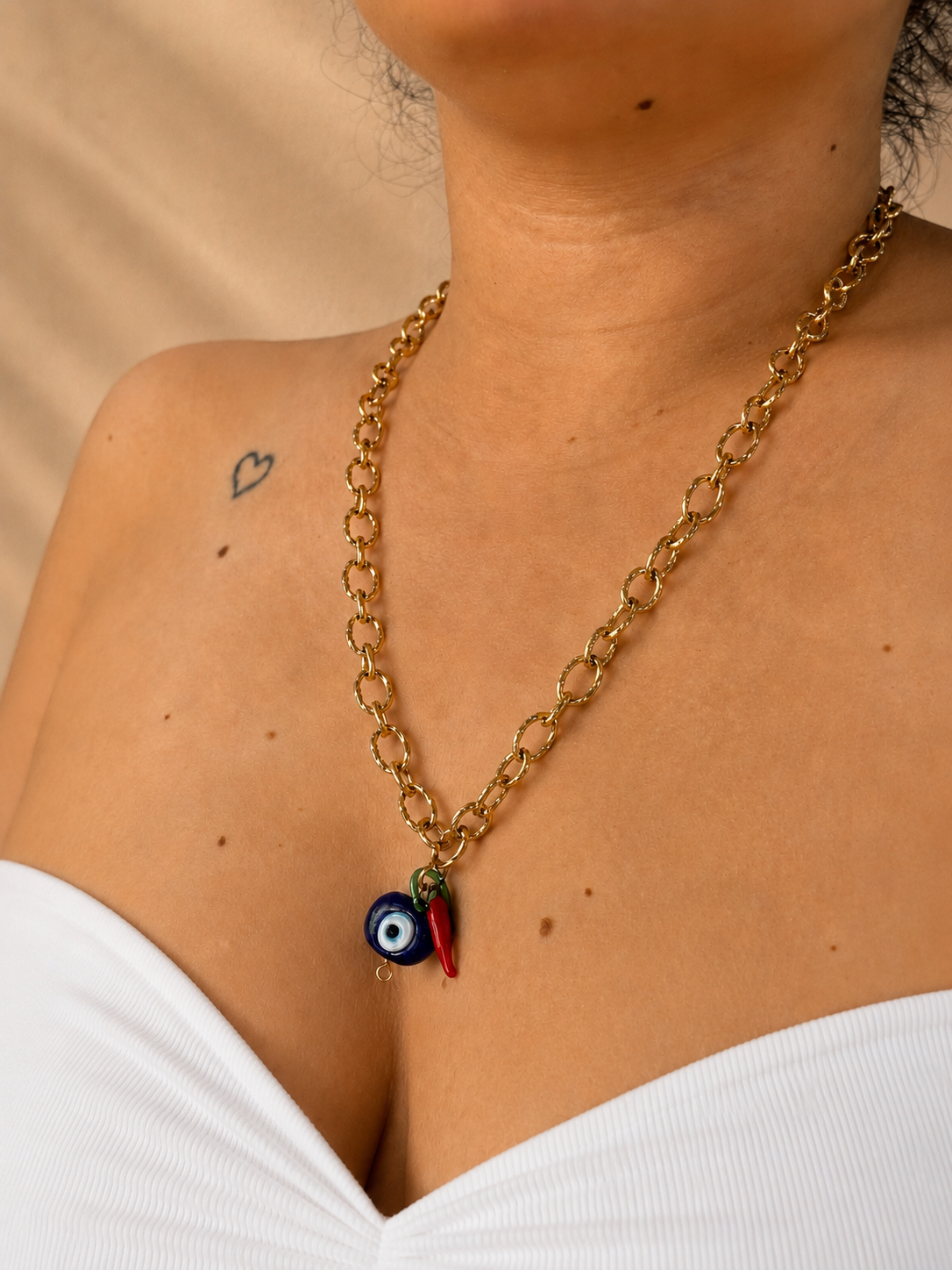 Collier Oeil et piment